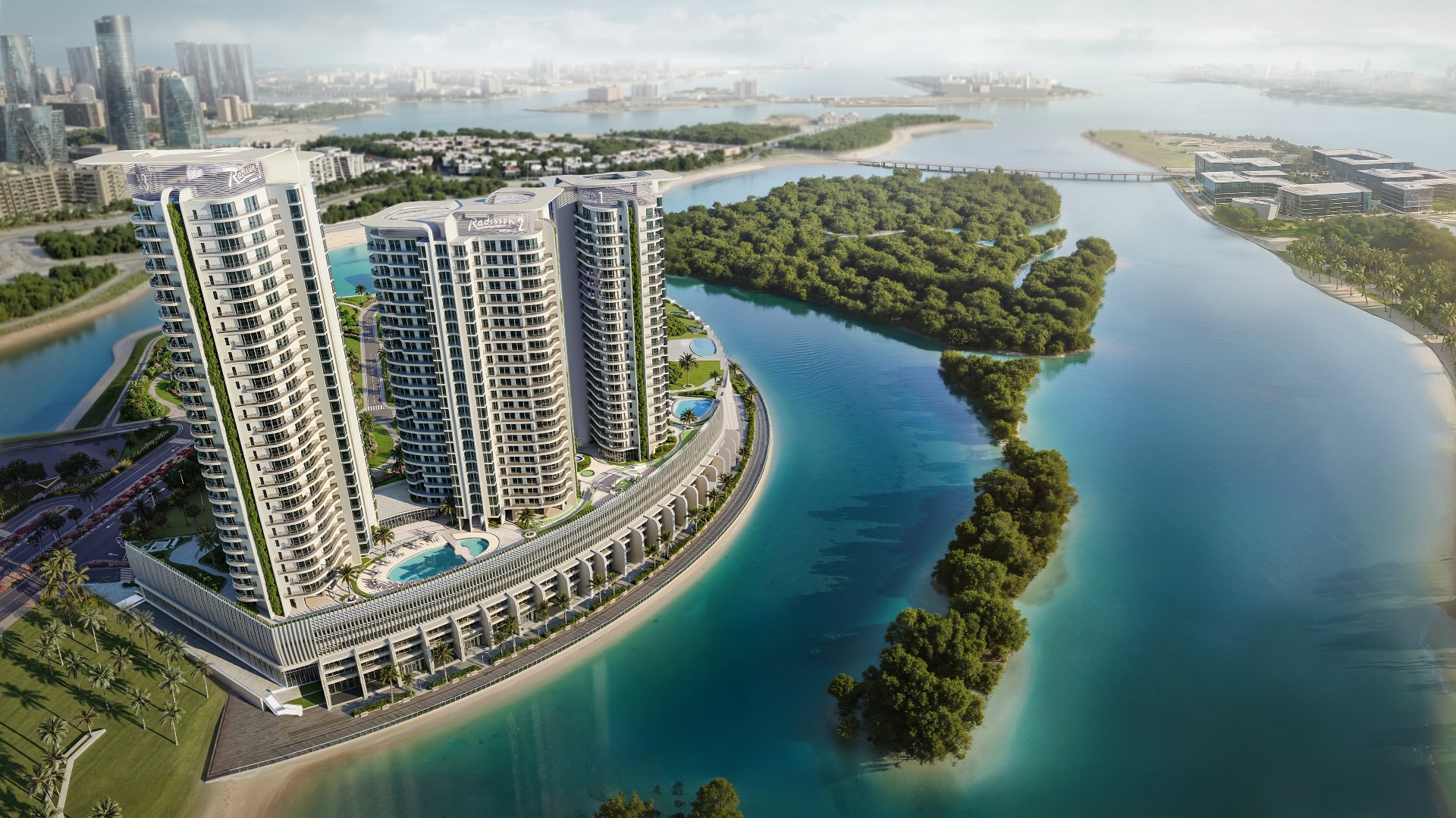 Aerial view of the three Radisson Residences towers on the tip of Al Reem Island