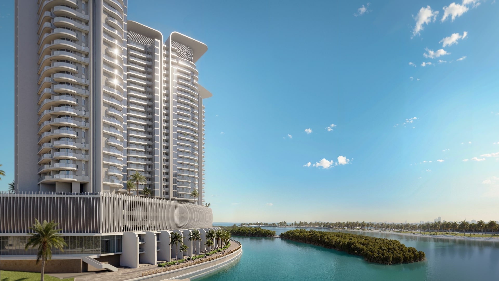 Radisson Residences towers rising above the waterway and mangroves